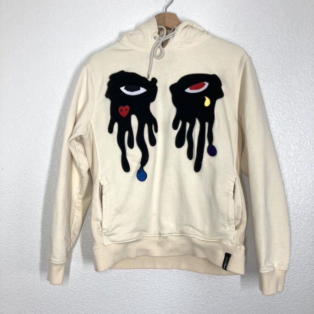 ROKU Studio Hoodie Mens Medium CreamFleece Pullover Dripping Eyes Graphic Art